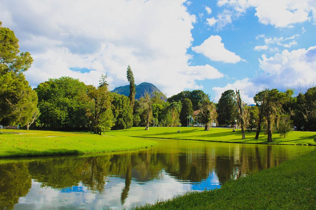 Panoramic view of a lush green golf course at Highland Golf Course. Smooth