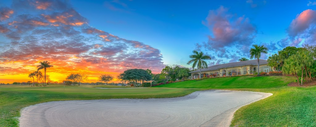 Panoramic view of a lush green golf course at Abacoa Golf Club. Smooth