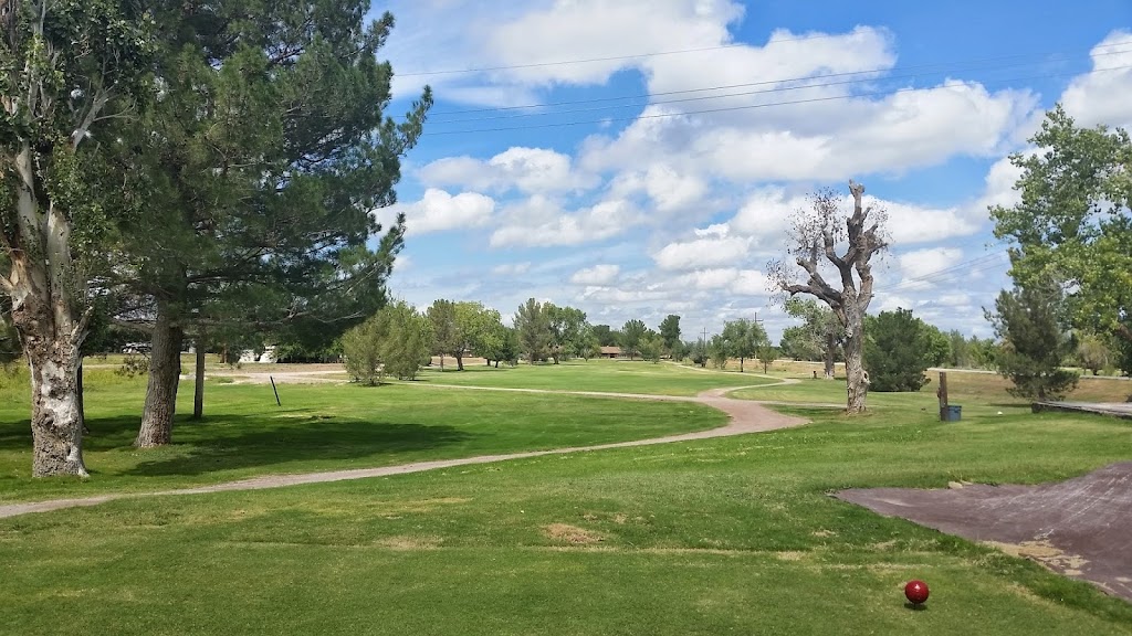 Panoramic view of a lush green golf course at Anthony Country Club. Smooth