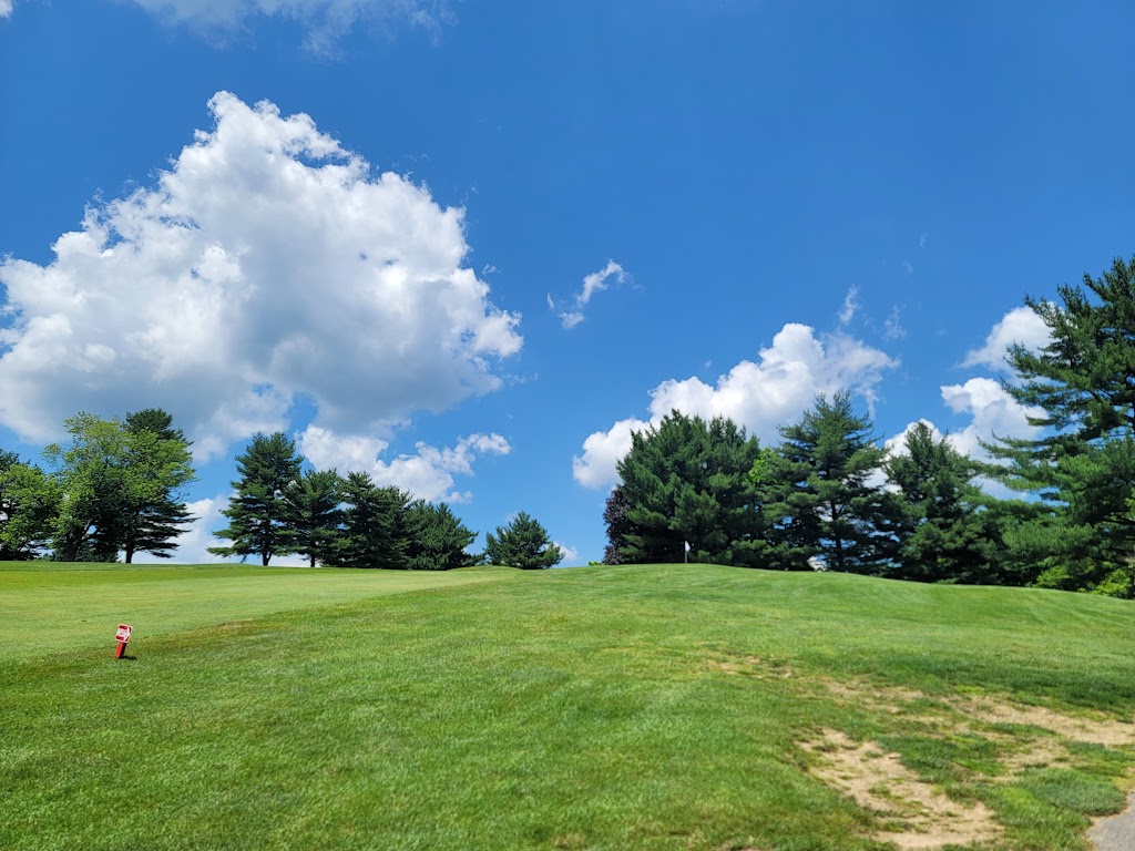 Panoramic view of a lush green golf course at Armitage Golf Club. Smooth