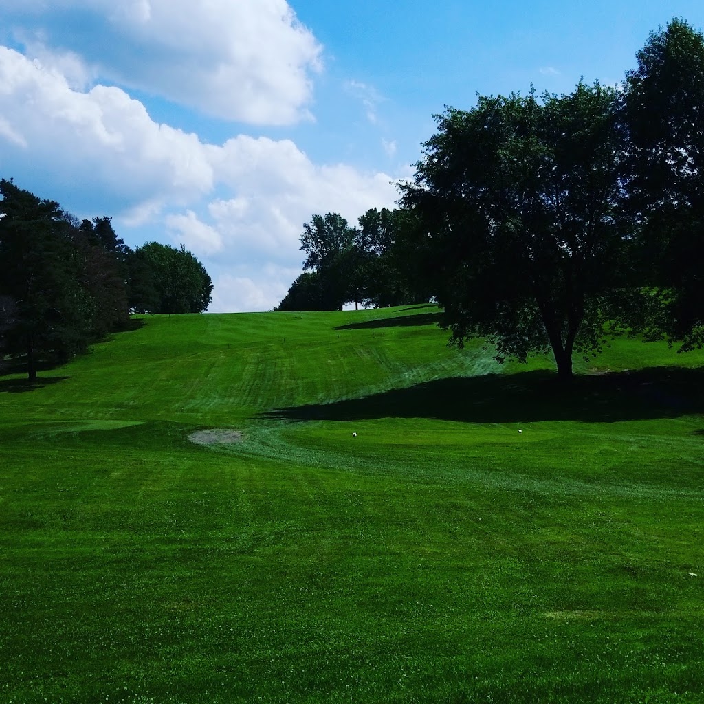 Panoramic view of a lush green golf course at Arrowhead Golf Club & Banquet Center. Smooth