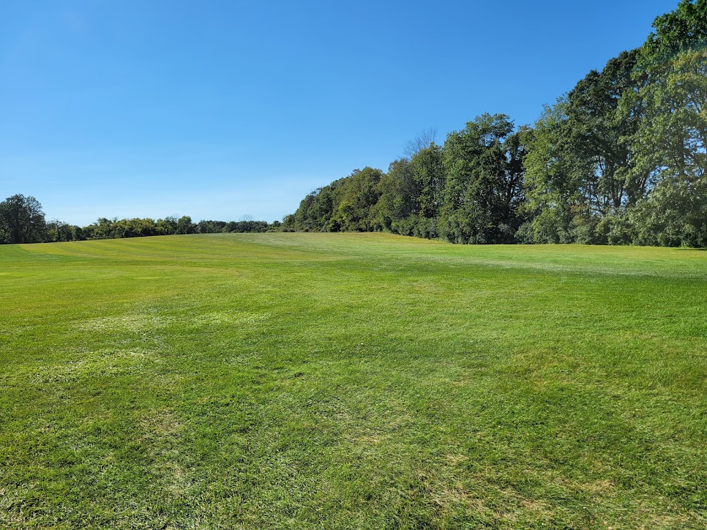 Panoramic view of a lush green golf course at Arrowhead Golf Course. Smooth