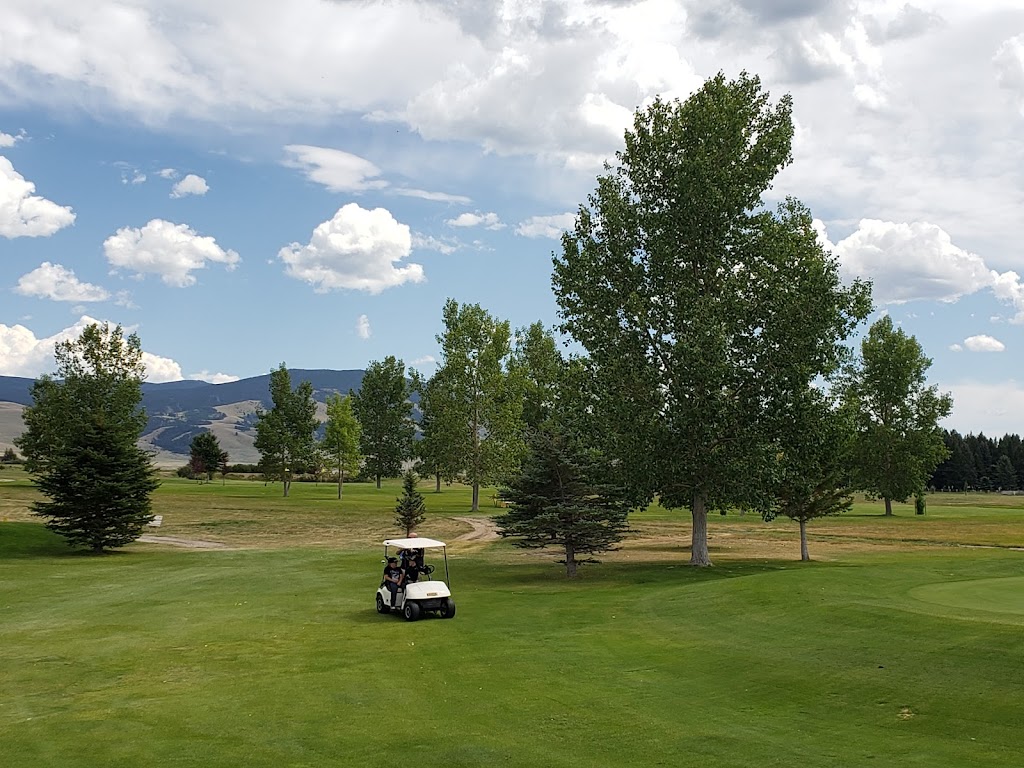 Panoramic view of a lush green golf course at Arrowhead Meadows Golf Course. Smooth