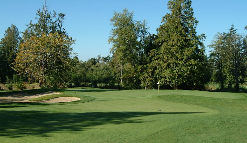 Panoramic view of a lush green golf course at Bald Eagle Golf Course. Smooth