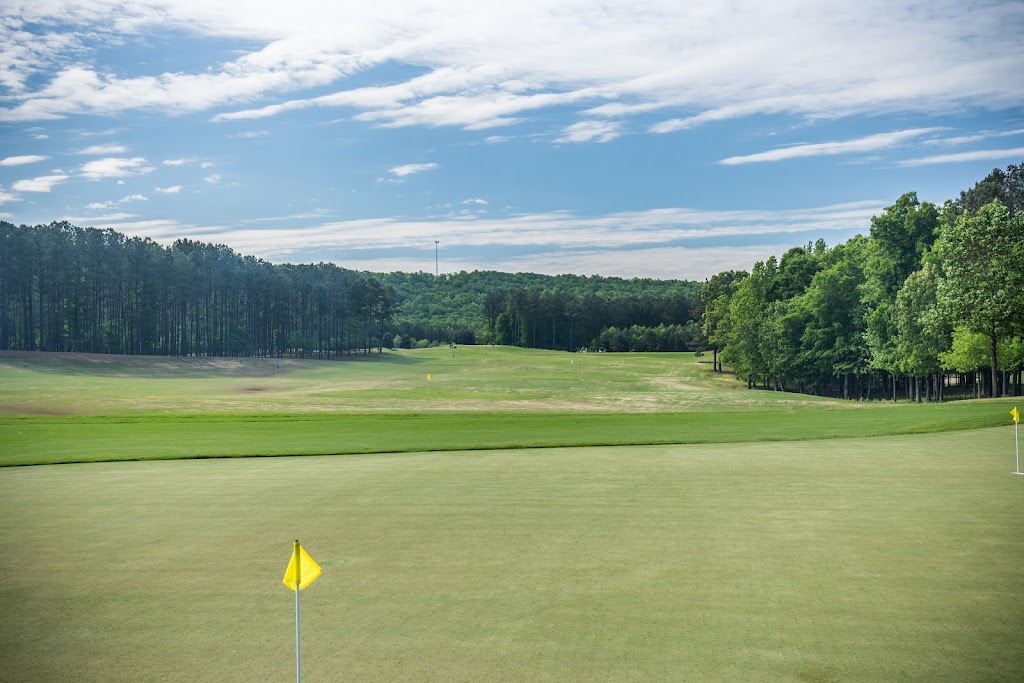 Panoramic view of a lush green golf course at Ballantrae Golf Club. Smooth