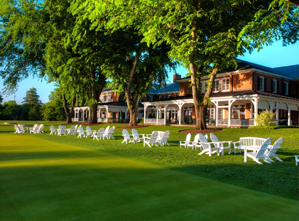 Panoramic view of a lush green golf course at Baltimore Country Club. Smooth