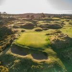 Panoramic view of a lush green golf course at Bandon Dunes Golf Resort - Bandon Preserve. Smooth