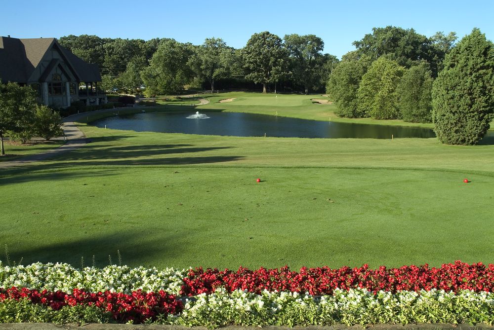 Panoramic view of a lush green golf course at Bartlett Hills Golf Club. Smooth