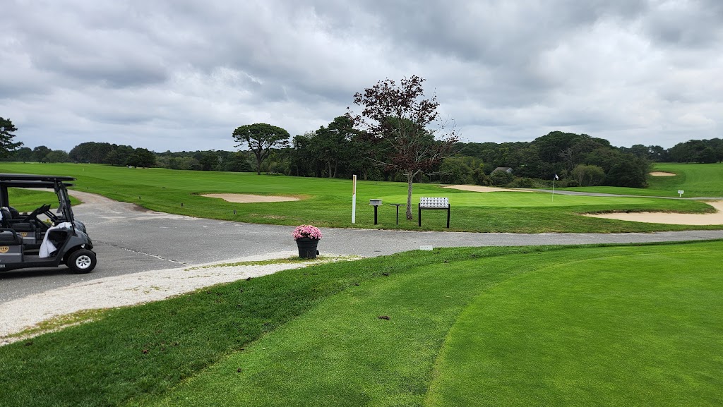 Panoramic view of a lush green golf course at Bass River Golf Course. Smooth