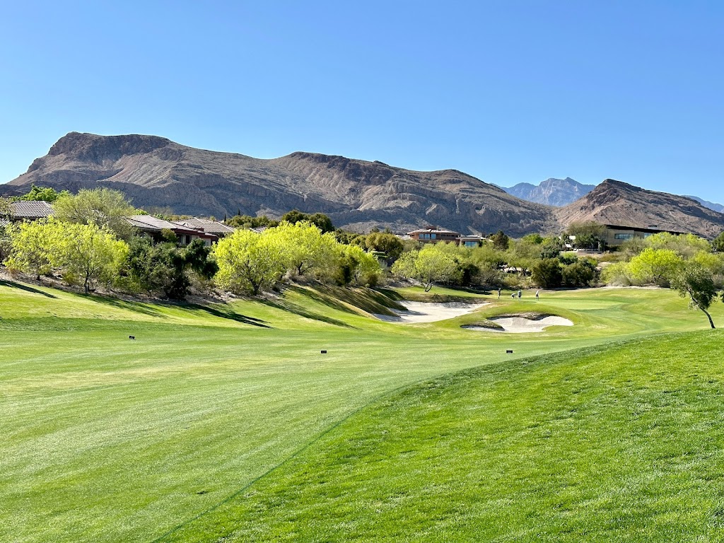 Panoramic view of a lush green golf course at Bear's Best Las Vegas. Smooth