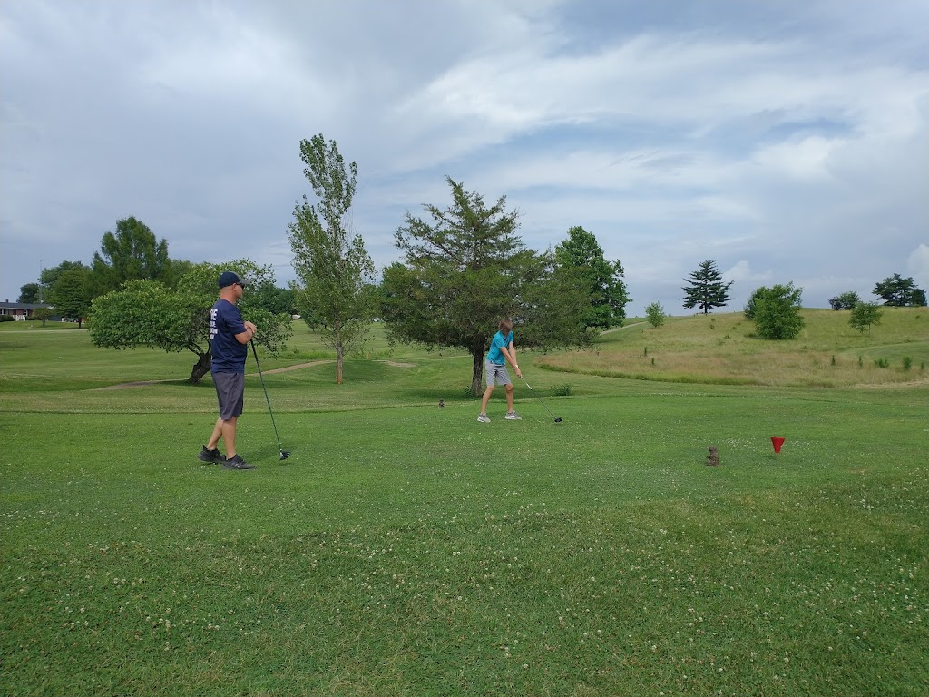 Panoramic view of a lush green golf course at Beaver Valley Golf. Smooth