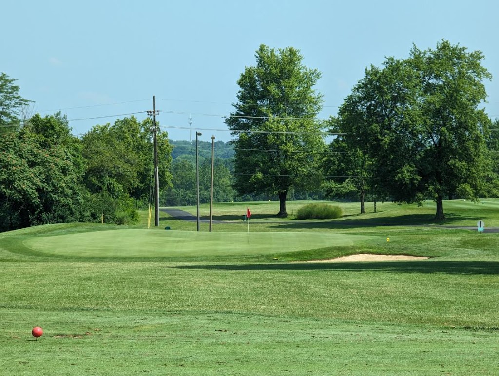 Panoramic view of a lush green golf course at Beckett Ridge Golf Club. Smooth