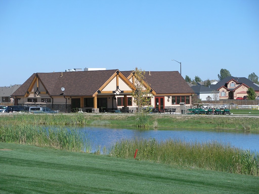 Panoramic view of a lush green golf course at Bella Rosa Golf Course. Smooth