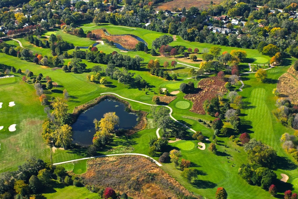 Panoramic view of a lush green golf course at Belmont Golf Club. Smooth