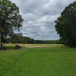 Panoramic view of a lush green golf course at Bethpage Green Golf Course. Smooth