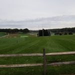 Panoramic view of a lush green golf course at Bethpage Green Golf Course. Smooth