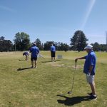 Panoramic view of a lush green golf course at Big Spring Lake Golf Club. Smooth