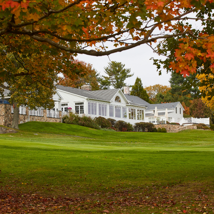 Panoramic view of a lush green golf course at Birchwood Country Club. Smooth