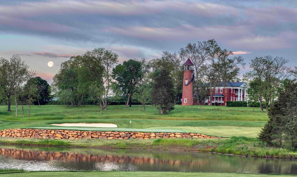 Panoramic view of a lush green golf course at Birdwood Golf Course. Smooth