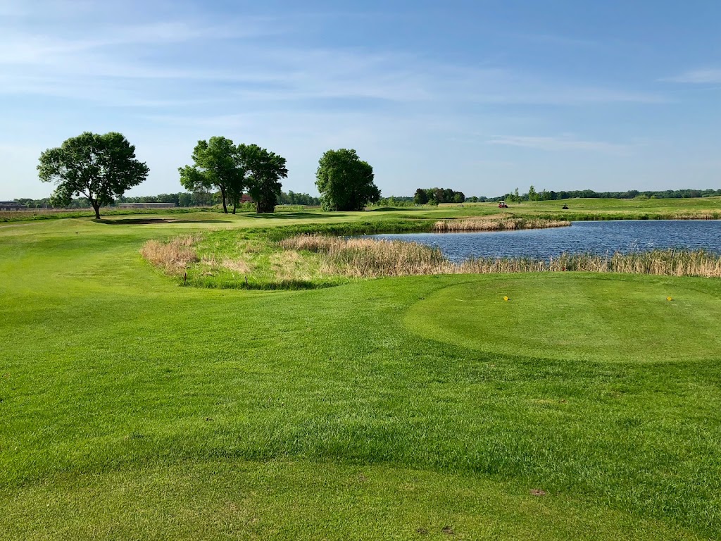 Panoramic view of a lush green golf course at Blackberry Ridge Golf Club. Smooth