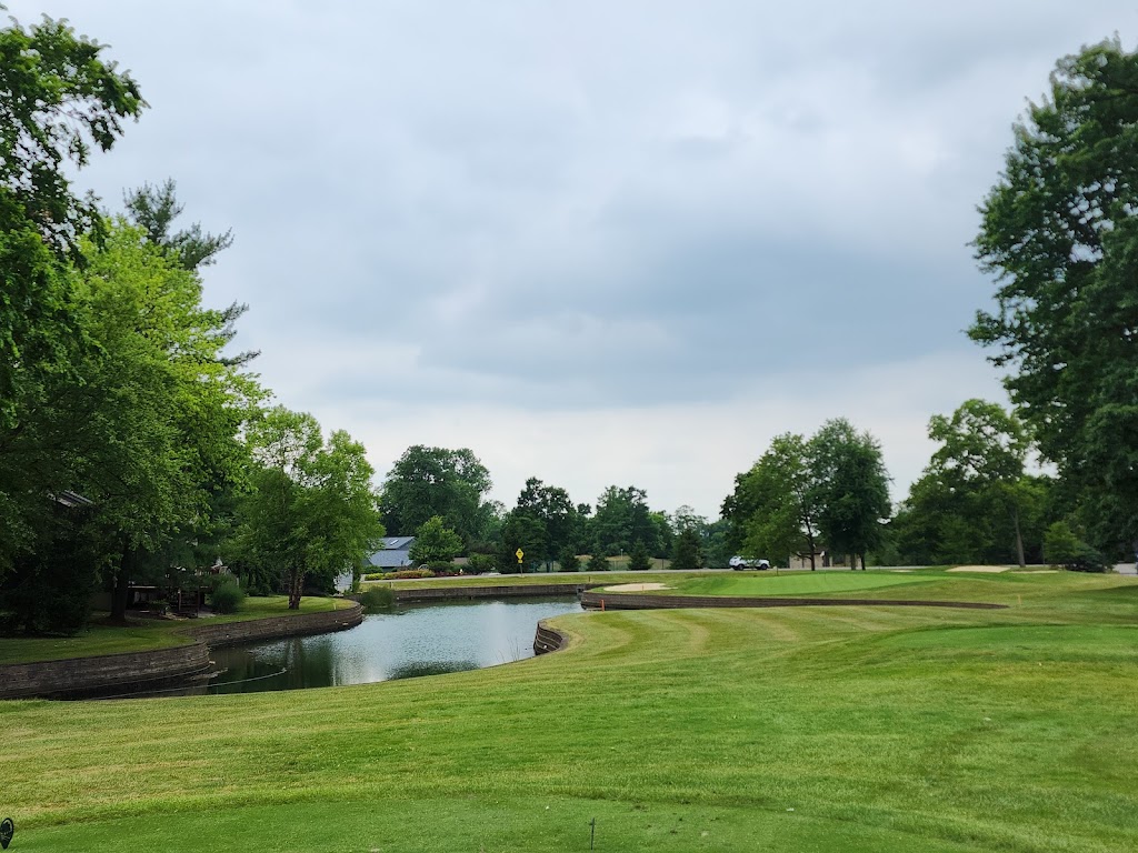 Panoramic view of a lush green golf course at Blue Ash Golf Course. Smooth