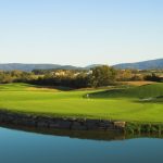 Panoramic view of a lush green golf course at Blue Ridge Shadows Golf Club. Smooth