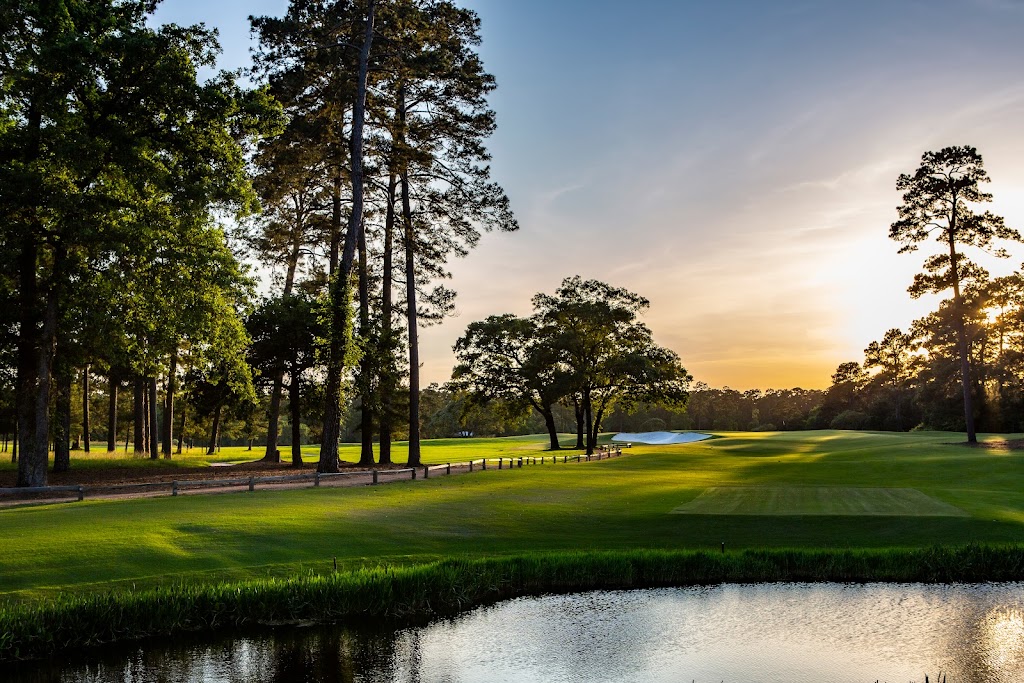 Panoramic view of a lush green golf course at Bluejack National Club & Community. Smooth