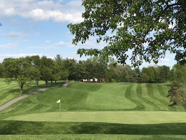 Panoramic view of a lush green golf course at Boone Links Golf & Event Center. Smooth