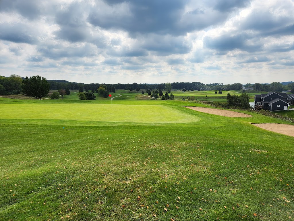 Panoramic view of a lush green golf course at Boulder Creek Golf Club & Restaurant. Smooth