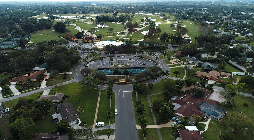 Panoramic view of a lush green golf course at Bradenton Country Club. Smooth