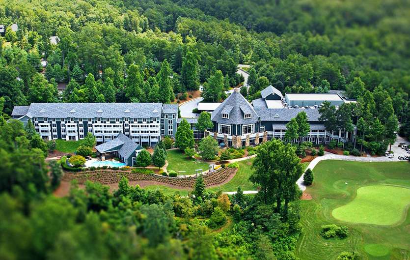 Panoramic view of a lush green golf course at Brasstown Valley Resort & Spa. Smooth