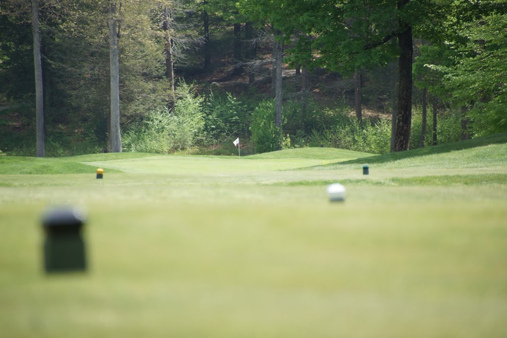 Panoramic view of a lush green golf course at Brattleboro Country Club. Smooth