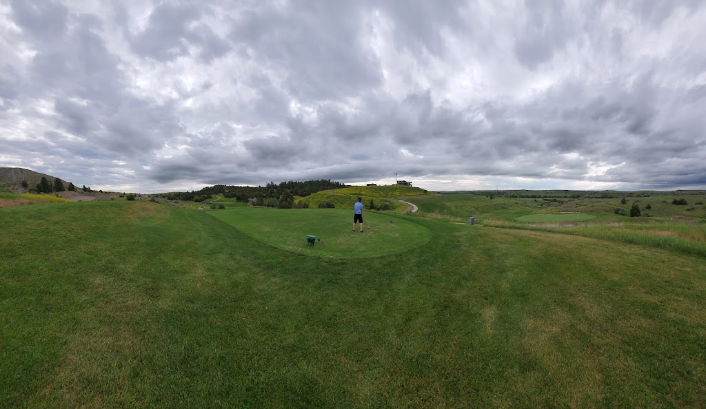 Panoramic view of a lush green golf course at Briarwood Country Club. Smooth