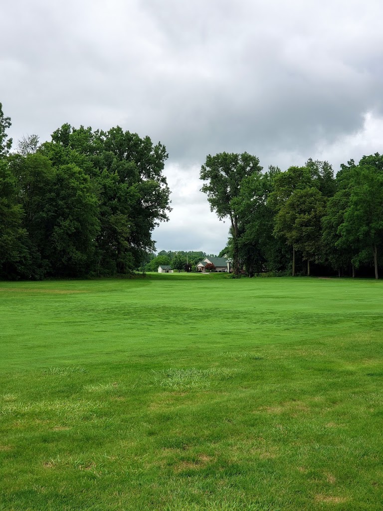 Panoramic view of a lush green golf course at Bridgewater Golf Club. Smooth