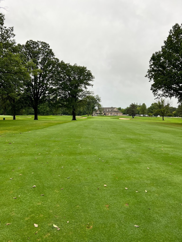 Panoramic view of a lush green golf course at Brown County-Riverdale Golf Course. Smooth