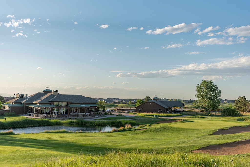 Panoramic view of a lush green golf course at Buffalo Run Golf Course. Smooth