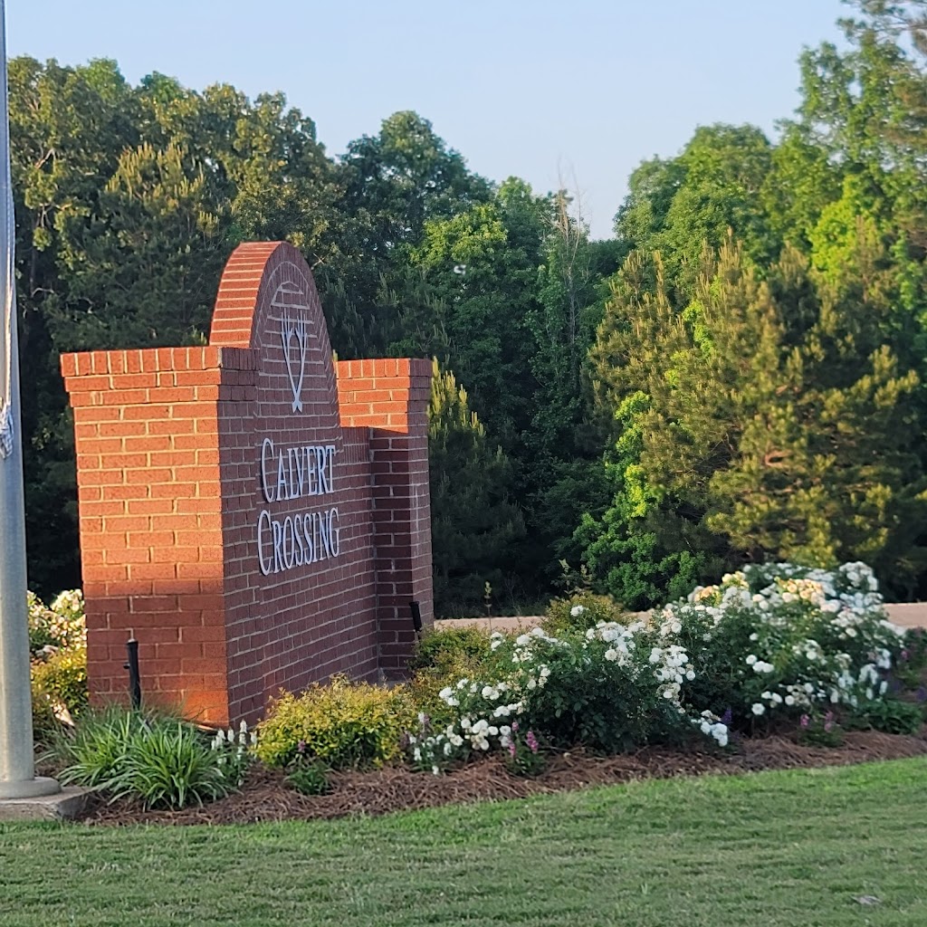 Panoramic view of a lush green golf course at Calvert Crossing Golf Club.. Smooth