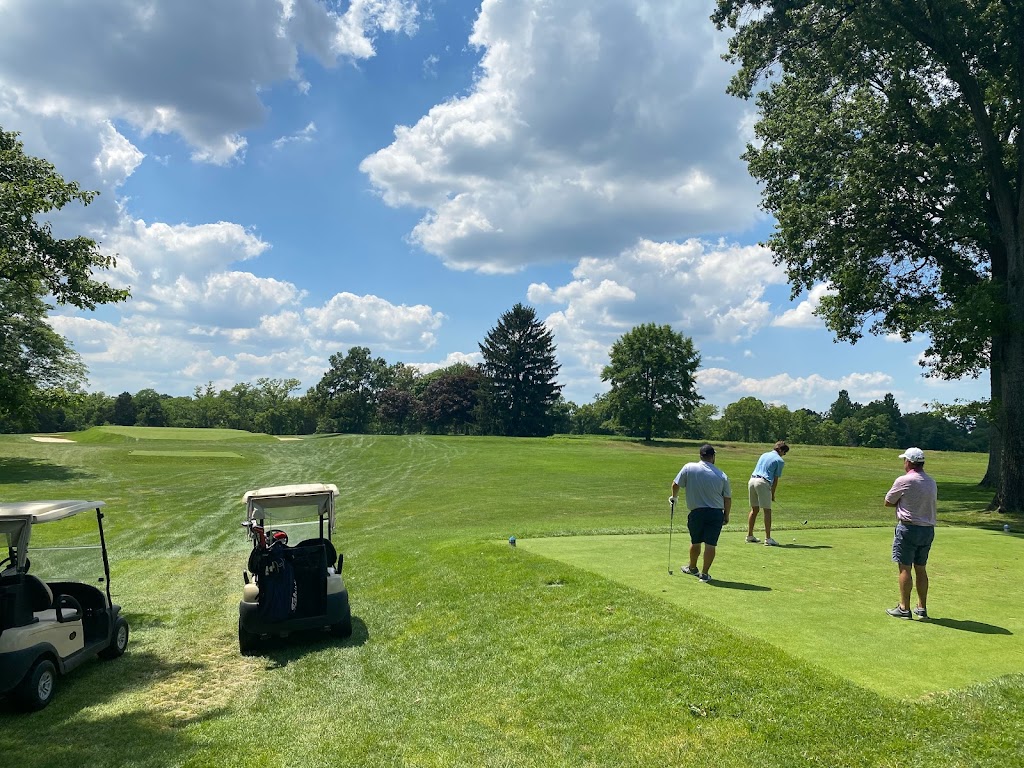 Panoramic view of a lush green golf course at Camargo Club. Smooth