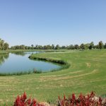 Panoramic view of a lush green golf course at Camelback Golf Club. Smooth