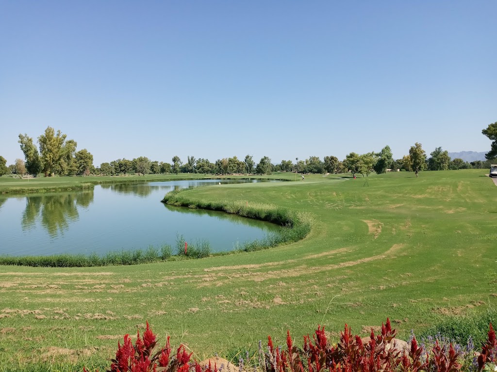 Panoramic view of a lush green golf course at Camelback Golf Club. Smooth