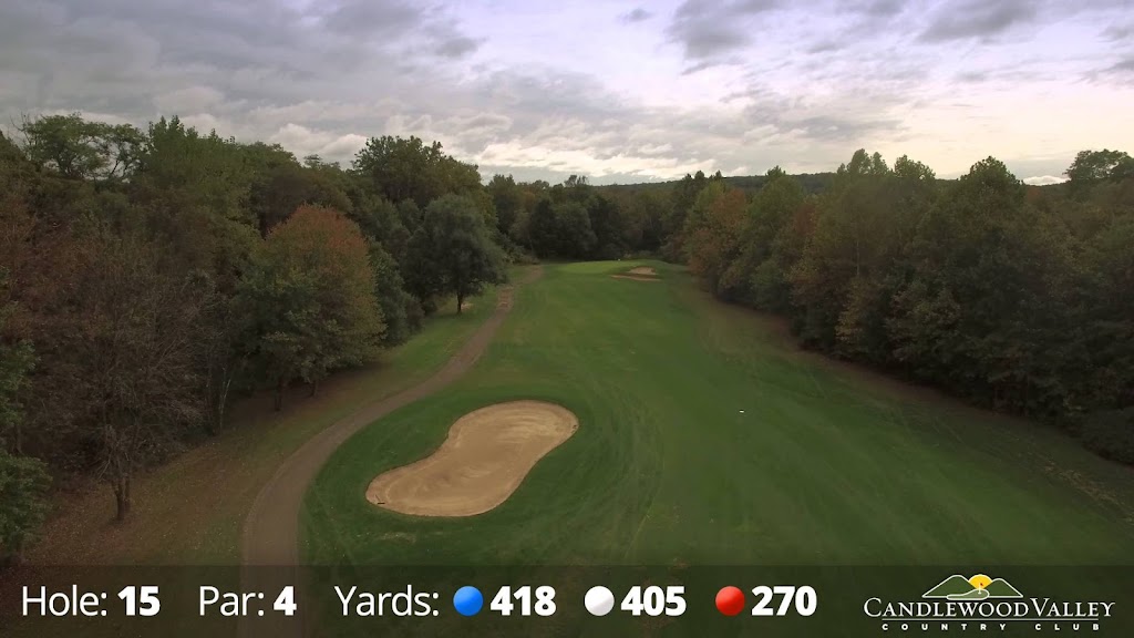 Panoramic view of a lush green golf course at Candlewood Valley Country Club. Smooth