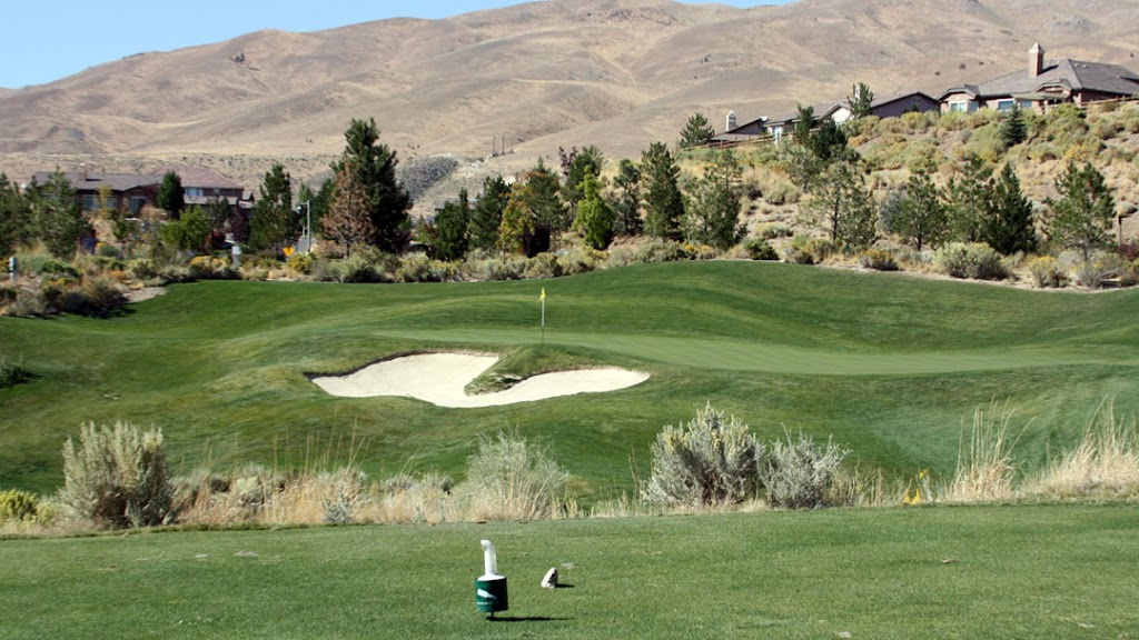 Panoramic view of a lush green golf course at Canyon Nine Golf Course. Smooth