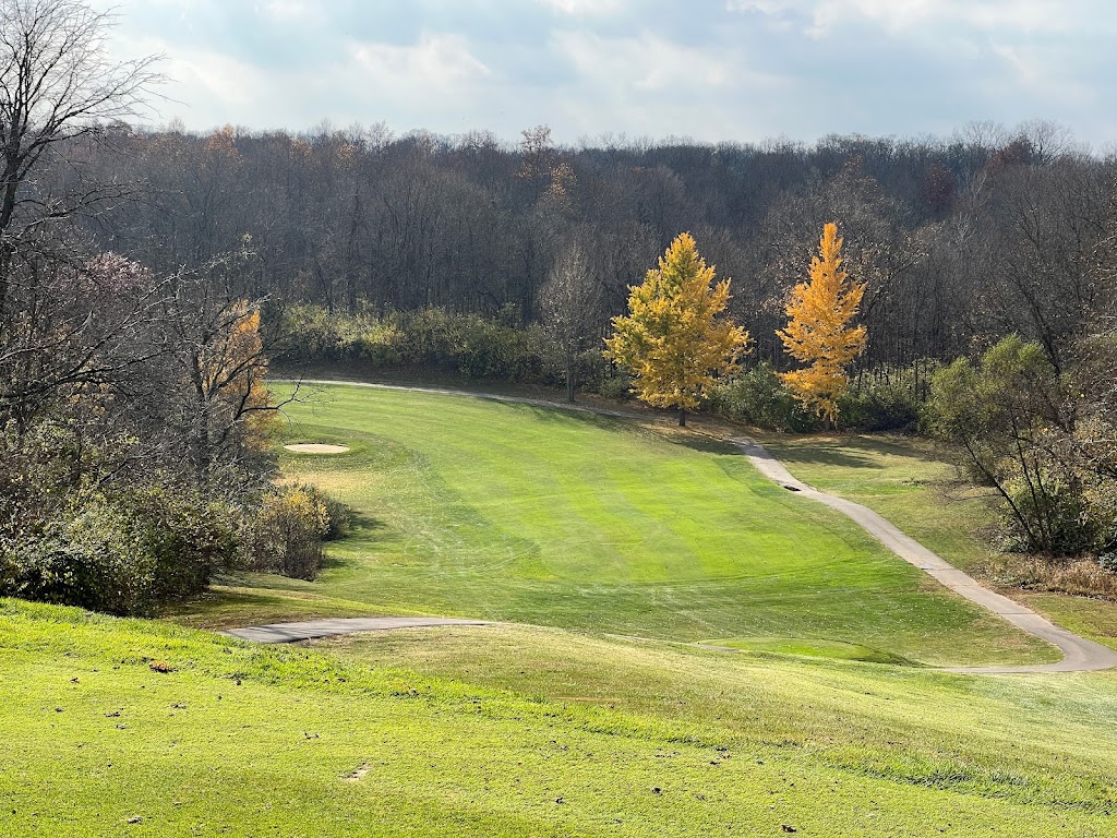 Panoramic view of a lush green golf course at Cassel Hills Golf Course. Smooth