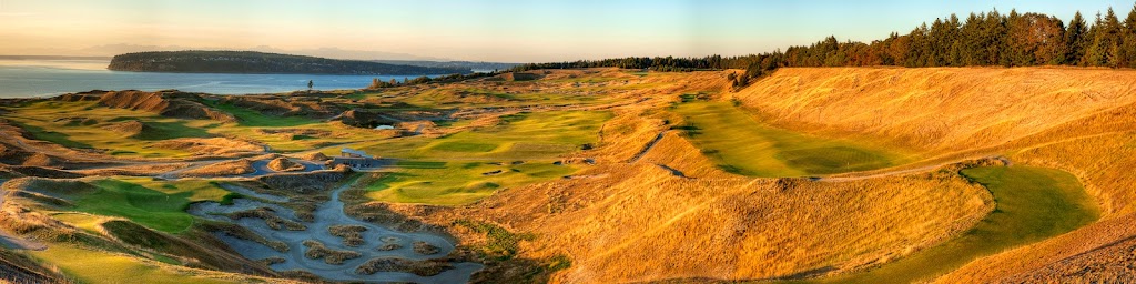 Panoramic view of a lush green golf course at Chambers Bay Golf Course. Smooth