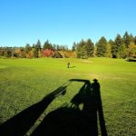 Panoramic view of a lush green golf course at Chehalem Glenn Golf Course. Smooth