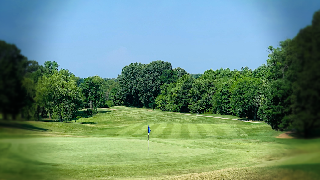 Panoramic view of a lush green golf course at Cherokee Valley Golf Club. Smooth