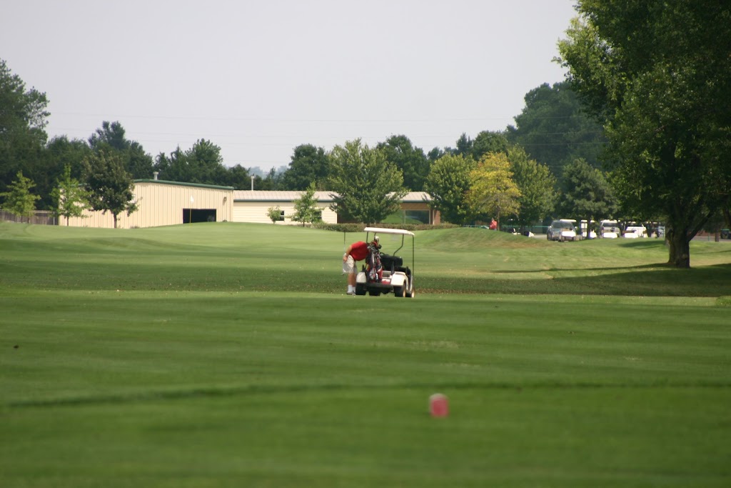 Panoramic view of a lush green golf course at Cherry Oaks Golf Course. Smooth