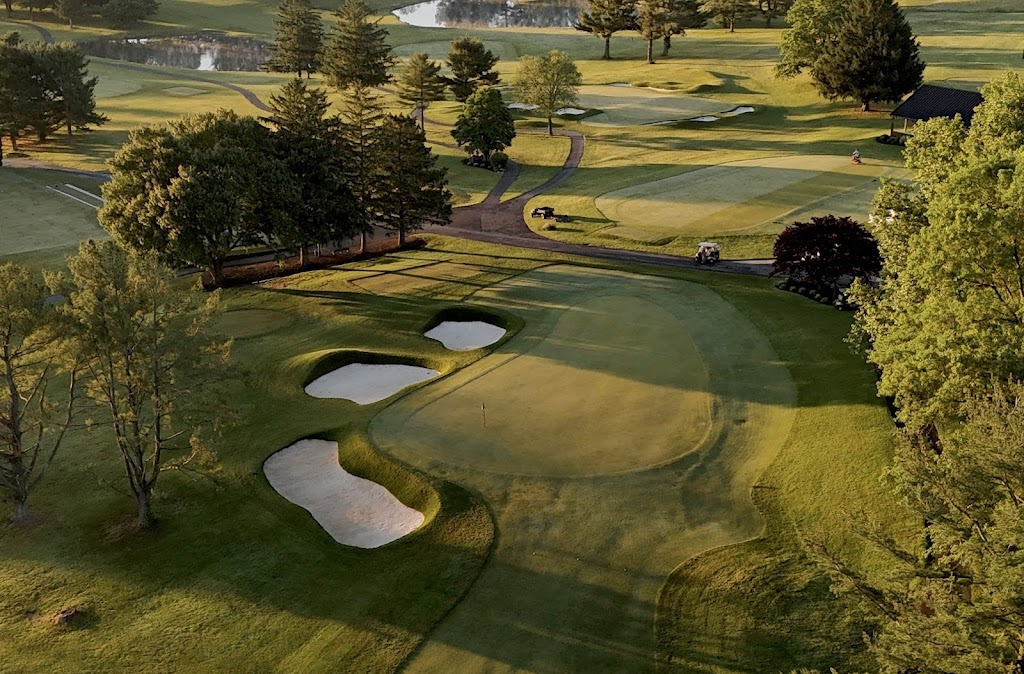 Panoramic view of a lush green golf course at Chesapeake Bay Golf Club. Smooth