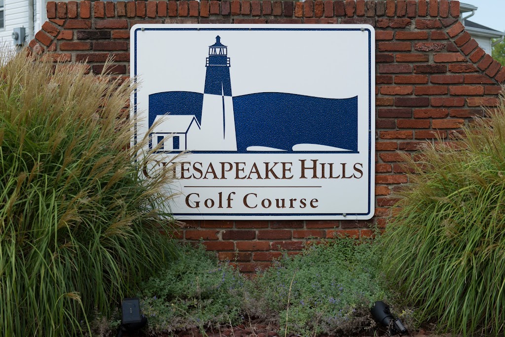 Panoramic view of a lush green golf course at Chesapeake Hills Golf Course. Smooth