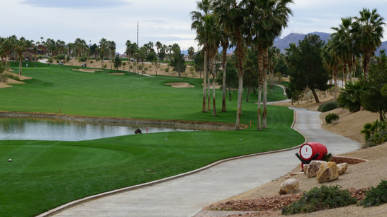 Panoramic view of a lush green golf course at Chimera Golf Club. Smooth